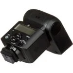Professional camera flashgun with digital display for photography lighting.