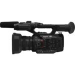 Panasonic 4K camcorder with professional controls and microphone, ideal for videography and cinema.