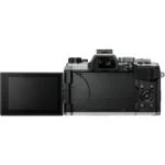 Back view of a mirrorless camera with a flip-out screen, available at a UK camera shop.