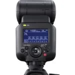 Camera flashgun with digital display and control buttons, ideal for professional photography lighting.