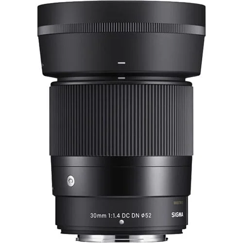 Sigma 30mm f/1.4 DC DN lens for mirrorless cameras, available at Camix UK.