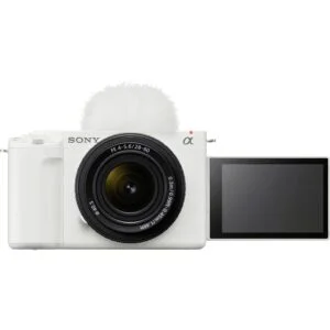 Sony mirrorless camera with lens and flip-out screen, ideal for photography and video.