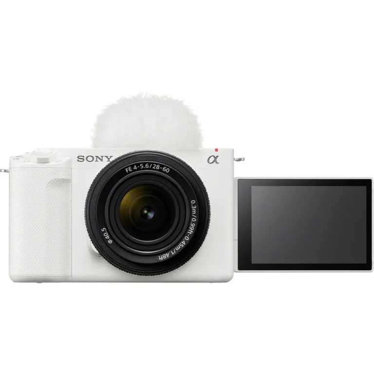 Sony mirrorless camera with lens and flip-out screen, ideal for photography and video.