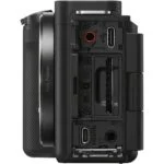 Side view of a full-frame mirrorless camera body with various ports and slots.