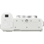 Bottom view of a white mirrorless camera body with lens mount, available at Camix UK.