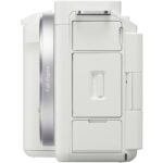 Side view of a white full-frame mirrorless camera body.
