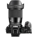 Top view of a Nikon camera with a Sigma 16mm lens, ideal for photography enthusiasts.