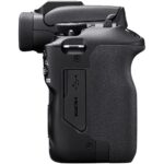 Side view of a black DSLR camera body with HDMI and USB ports.