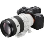 Sony mirrorless camera with telephoto lens on display at a UK camera shop.