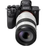 Sony mirrorless camera with a large zoom lens, ideal for professional photography.
