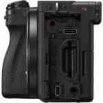 Side view of a digital camera body with open ports and slots, available at Camix UK.