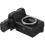Sony mirrorless camera body with battery, ideal for photography enthusiasts.