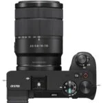 Sony mirrorless camera with zoom lens, top view, available at Camix UK.