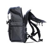 Gray camera backpack with multiple compartments and padded straps, ideal for photography gear.