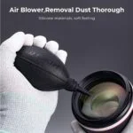 K&F Concept air blower cleaning camera lens, photography accessory.