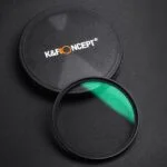 K&F Concept camera lens filter with case on dark background.