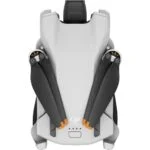 Top view of a folded DJI drone, compact and ready for transport.