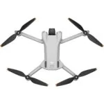 DJI drone with four propellers, ideal for aerial photography and videography.