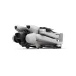 Folded DJI drone on white background, available at Camix camera shop UK.