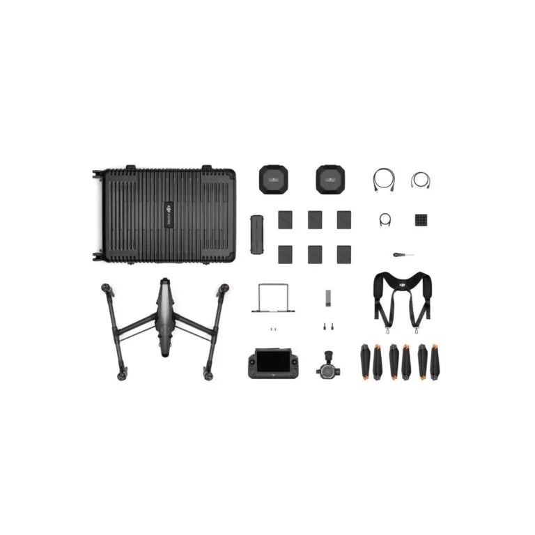 Complete drone kit with case, batteries, propellers, and accessories.