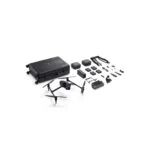 Complete DJI drone kit with accessories including case, batteries, and propellers.