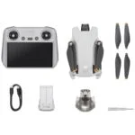DJI drone with controller and accessories, available at Camix camera shop UK.