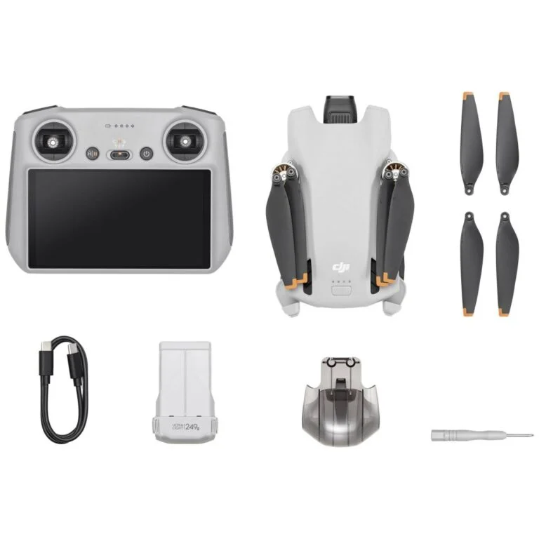 DJI drone with controller and accessories, available at Camix camera shop UK.