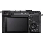 Back view of a mirrorless camera with LCD screen and control buttons.