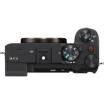 Top view of a mirrorless camera body with control dials and hot shoe mount.