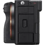 Side view of a mirrorless camera body with textured grip, available at Camix UK.