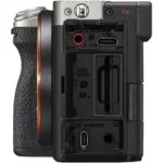 Back view of a mirrorless camera body showing ports and card slots, ideal for photography enthusiasts.