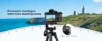 Camera on tripod capturing panoramic coastal view, showcasing photography equipment.