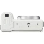 White mirrorless camera body on display at Camix, a camera shop in the UK.