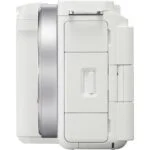 Side view of a white digital camera body, ideal for photography enthusiasts.