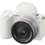 White Sony mirrorless camera with lens, ideal for photography enthusiasts.