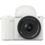White Sony mirrorless camera with lens, ideal for photography enthusiasts.