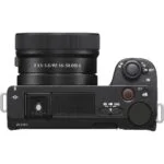 Top view of a mirrorless camera with a 16-50mm lens, ideal for photography enthusiasts.
