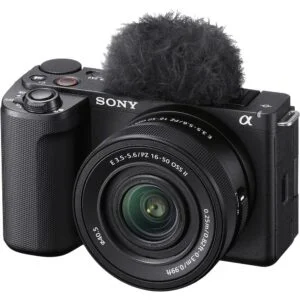 Sony mirrorless camera with lens and microphone, ideal for photography and video.