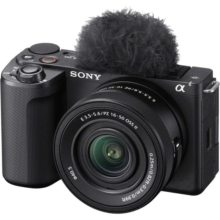Sony mirrorless camera with lens and microphone, ideal for photography and video.
