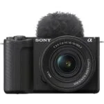 Sony mirrorless camera with lens and microphone, ideal for photography and video.