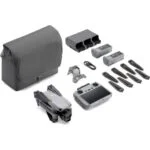 DJI drone with accessories including remote, batteries, and carrying bag, available at Camix camera shop UK.