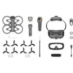 Drone and accessories including propellers, controller, and headset on display.
