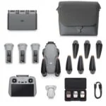 DJI drone with accessories including batteries, propellers, remote, and carrying case.