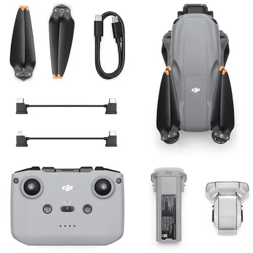 1729013580_IMG_2357911 DJI drone with remote, battery, propellers, and accessories, available at Camix camera shop UK.