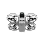 Compact DJI drone with protective propeller guards, ideal for aerial photography and videography.