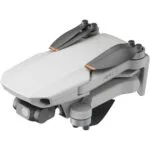 DJI Mini 2 SE drone folded, compact design for easy transport, ideal for aerial photography.