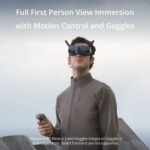 Person using motion control and goggles for first person view immersion.