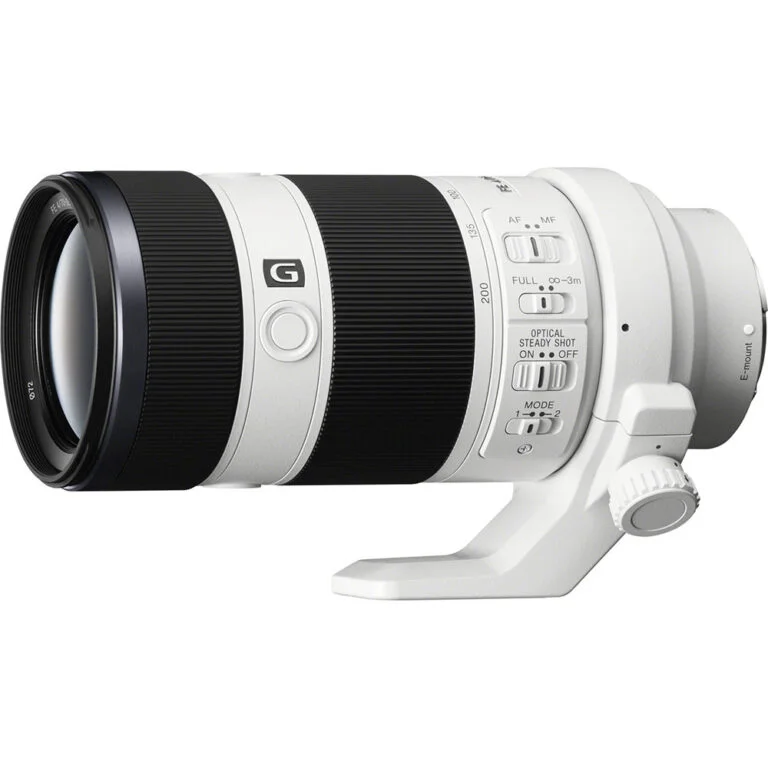 Sony telephoto zoom lens with tripod mount, ideal for professional photography.