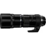 Professional telephoto camera lens with tripod mount for photography gear.