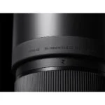 Close-up of a Sigma 50-100mm f/1.8 DC lens, ideal for professional photography.